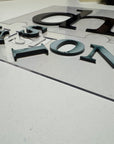 dh | acrylic sign